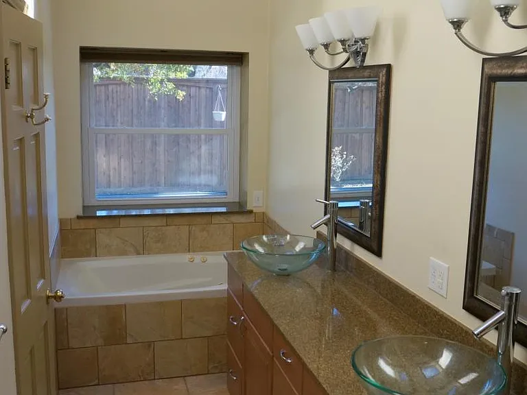 Master bathroom has a jetted tub on one side