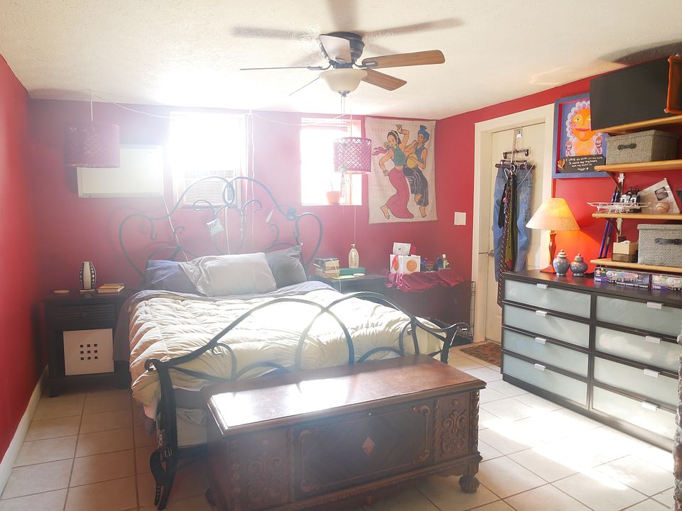 Bedroom furnished view with queen bed (note the walls are now a light grey)
