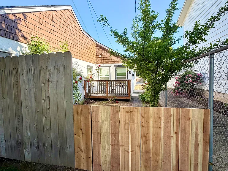 Brand new front gate to fully enclose the patio!