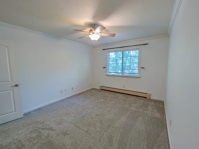 Master bedroom with north facing window making for dark, quiet sleeping conditions