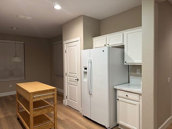 Kitchen pantry, refrigerator and coffee bar!