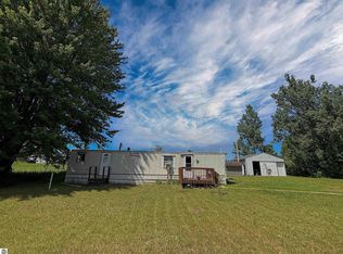 1395 E Duck Lake Rd, Grawn, MI 49637