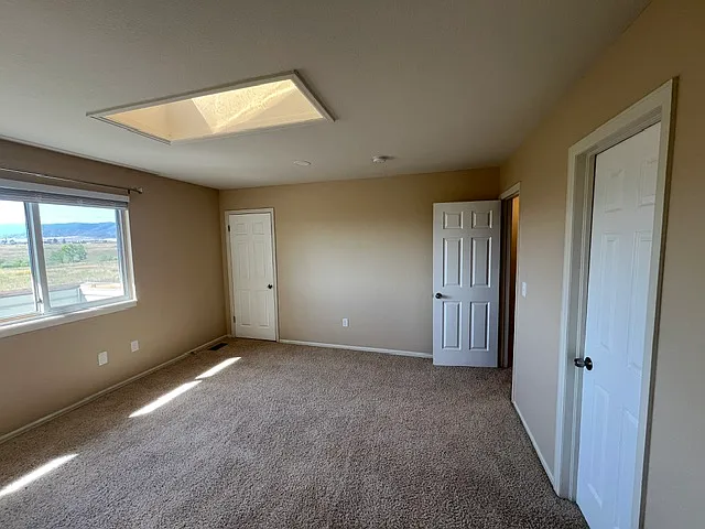 PRIMARY BEDROOM.