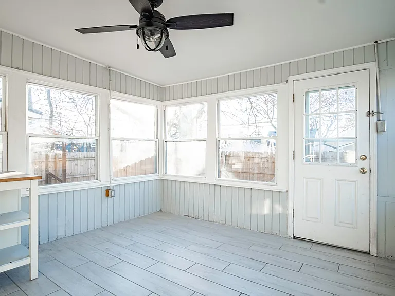 Three-season sunroom off the kitchen
