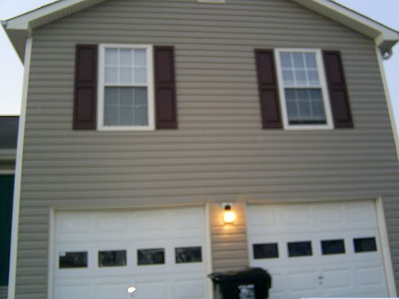 Front of house w/attached 2 car garage