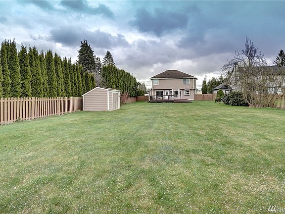 Wow!  HUGE Yard!  Room to run, to play, to garden... Room to breathe.  ENJOY! This lot/yard is a 'Total 10'.  There's room for RV parking, room to build a detached garage...  And maybe (?) a tiny home... For guests and/or  the relatives that ya love.  :-)  (Buyer to verify with The City of Puyallup.)  Pretty private. Pretty peaceful.  PRETTY NICE! And just plain pretty. Inside and out!