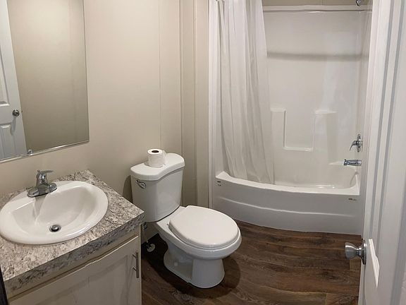 Panoramic pic of guest bathroom.