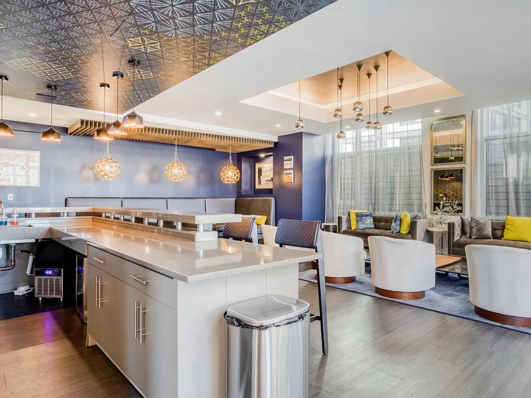 Self-service kitchenette and bar area