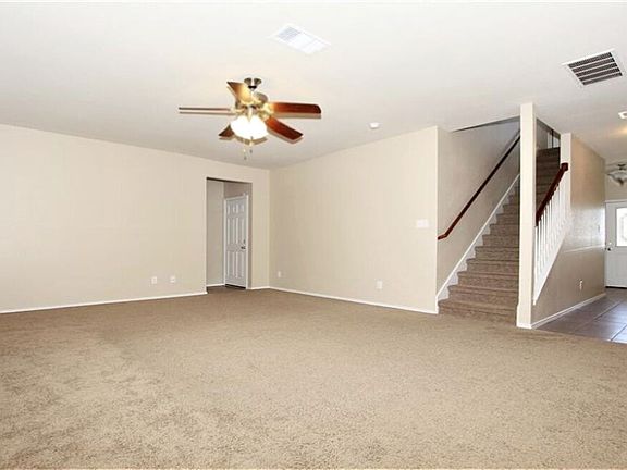 Large family room toward entry & stairway