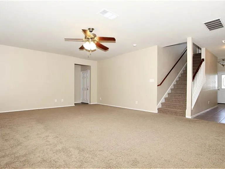 Large family room toward entry & stairway