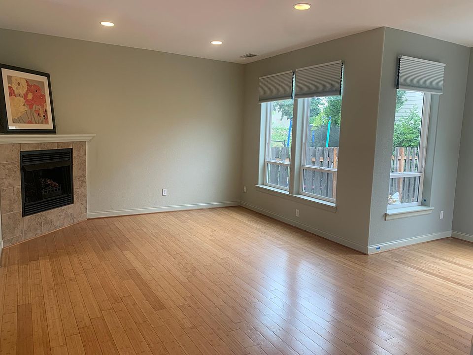 Gracious living room with gas fireplace.