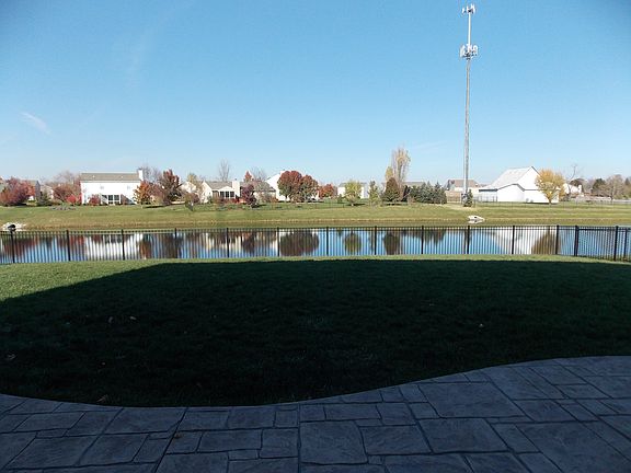 Pond view.  Aluminum fence