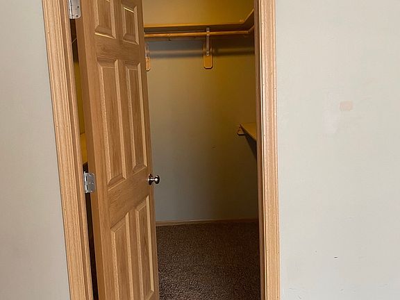 Walk in closet in upstairs bedroom
