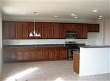 eat in kitchen and upgraded extended kitchen cabinets
