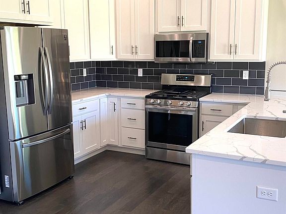 3rd image of 6721 Windsong Ct