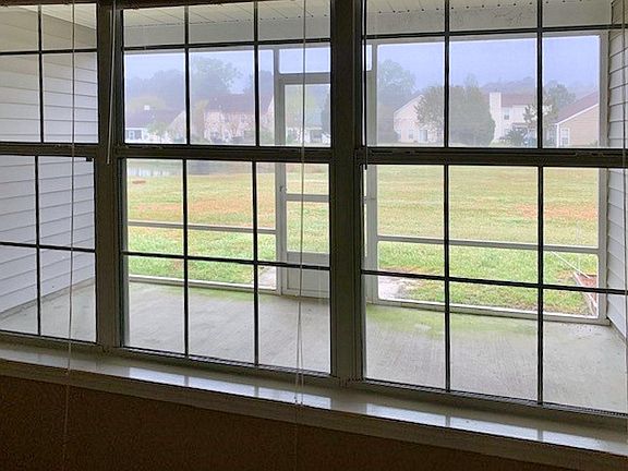Screened-in Porch overlooking a tranquil lagoon