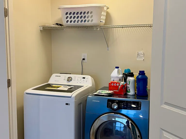 Washer and dryer included.