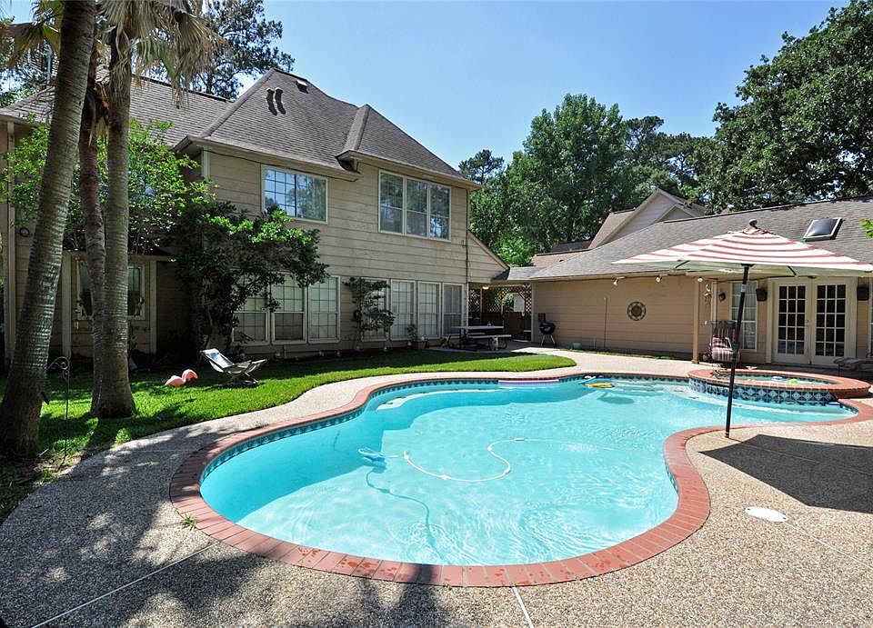 OH YEAH! Perfect summer time location. Large pool, spa, lots of decking, and notice the French doors that lead to large private guest room with full bath and a sauna that will stay! You can make this what ever you want to: pool cabana/extra game room