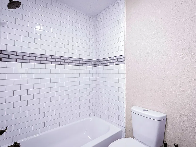 Full Bathroom with Luxury Tile