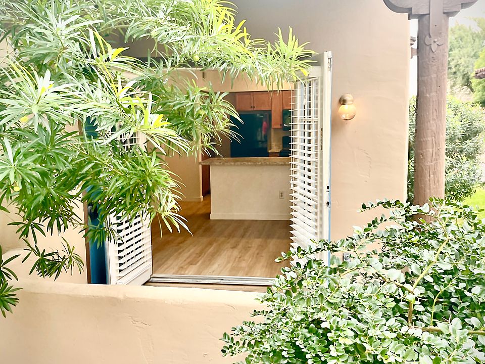 French doors open to large entertaining kitchen and dining area.