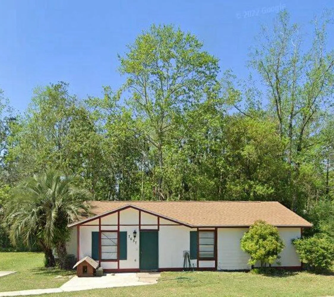 7637 Dartmoor Dr — Photo 1