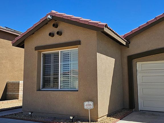 FRONT VIEW FROM THE GARAGE-SIDE OF THE HOME.