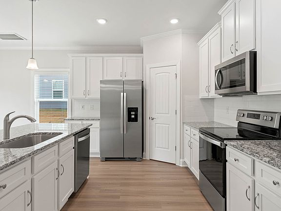 Stainless steel appliances are included