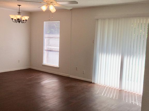 Living Area leading out to Large Backyard