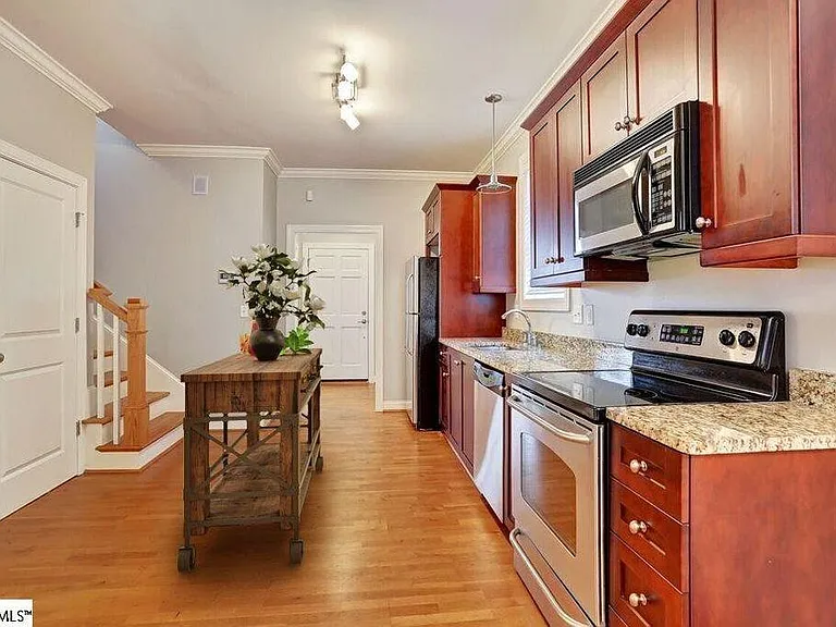 Stainless steel and granite kitchen