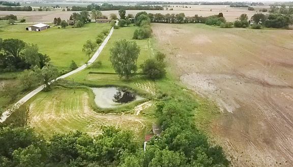 Private lane takes you to the property. Some of hay field can be pasture.