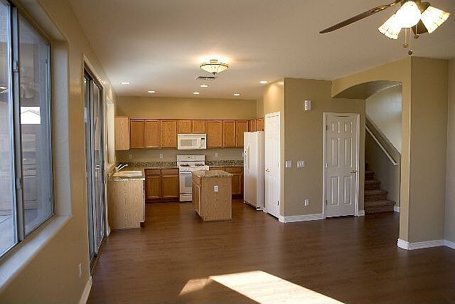 Kitchen has new granite countertops, new refrigerator, dishwasher, microwave, 