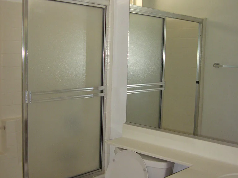 attached master bathroom has tub and shower