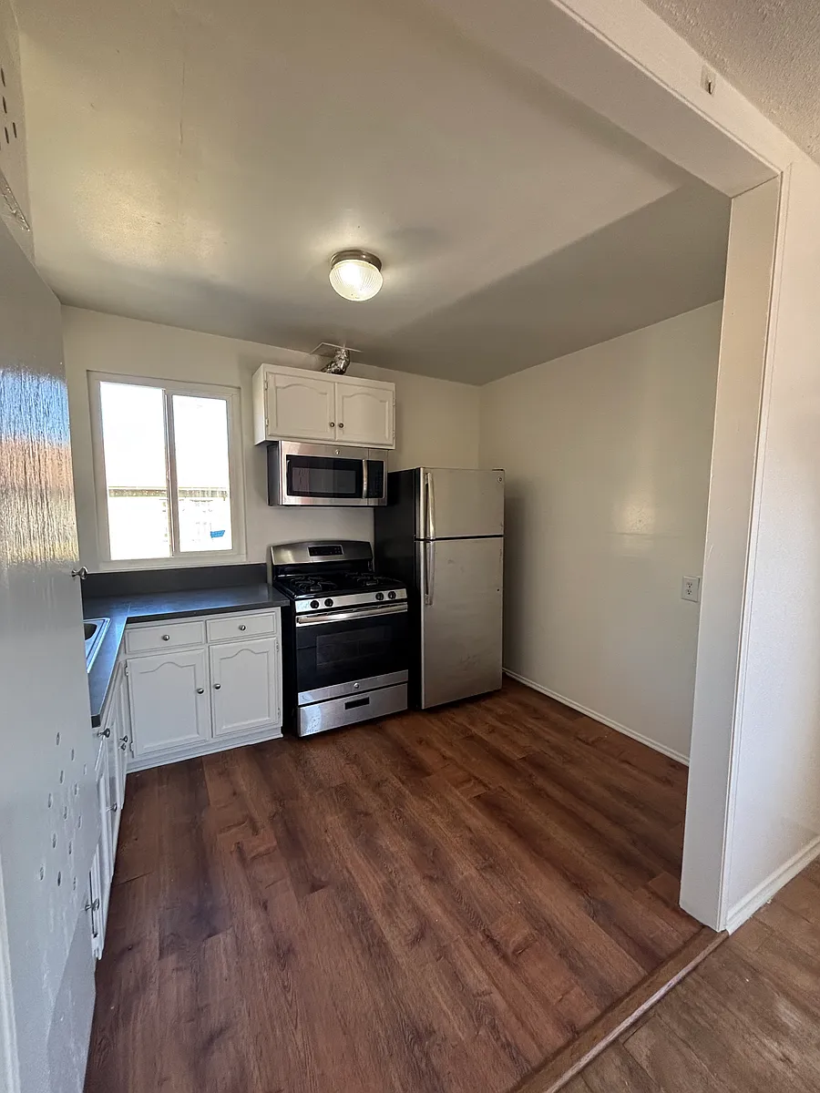 Building Photo - 1513 W 28th St #7