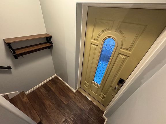 inside entrance. coat rack, etc.