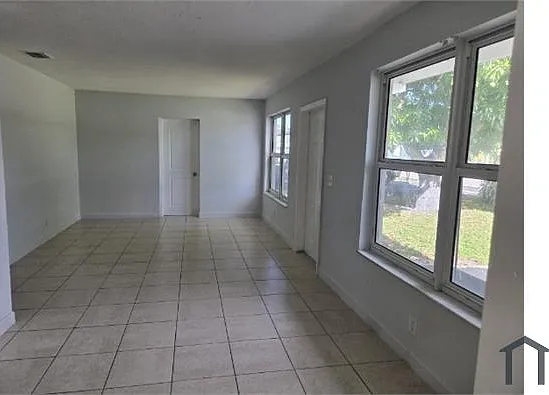 3295 NW 15th Ct — Photo 3