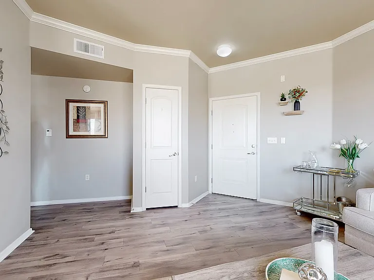 Step into style with this beautifully adorned living space, a perfect blend of sophistication and comfort.