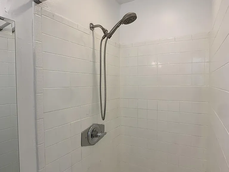 Shower head allows for hand held washing