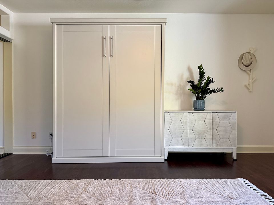Wall cabinet bed and sideboard furnishing included in unit