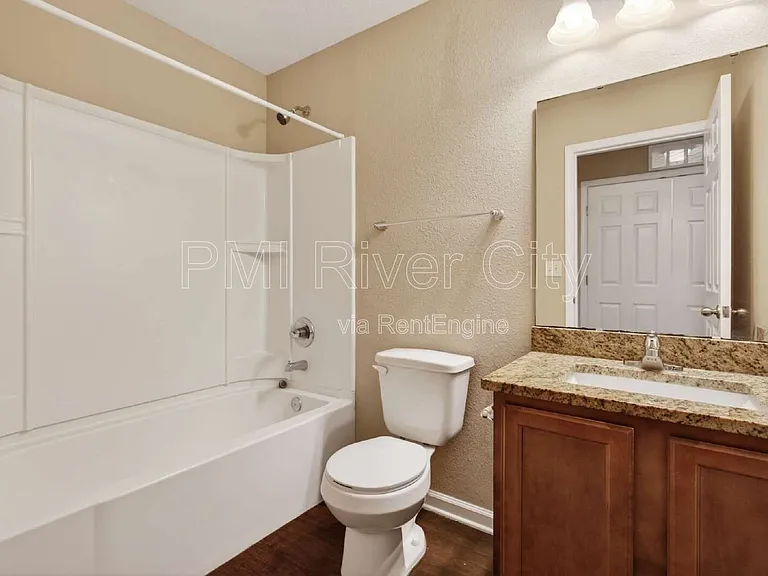 7608 Rain Forest Dr N — Photo 18