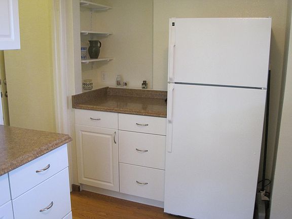 Kitchen/living room includes abundant storage