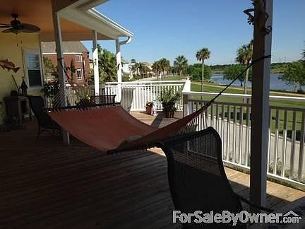 Covered Deck
						:
						Overlooks Clear Creek.