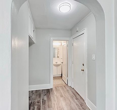Entry area, bathroom beyond