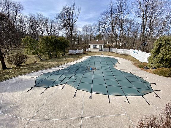 stunning pool with attached spa