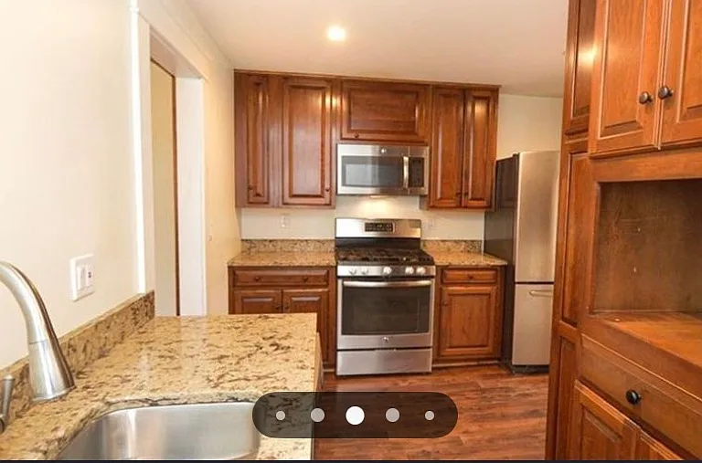Kitchen, mudroom to the right, dining room to the left.