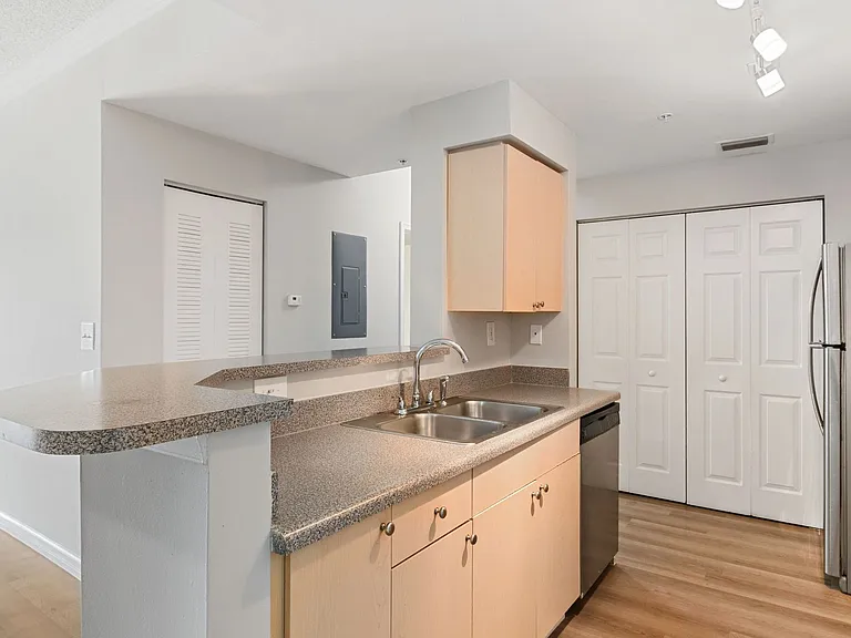 Partial classic kitchen with laminate counters and stainless