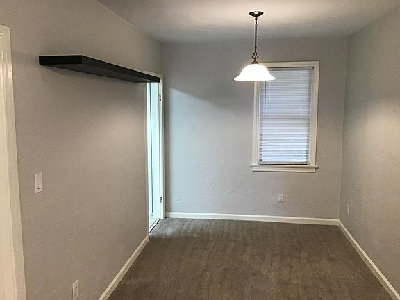 Dining room with doorway leading to the kitchen.
