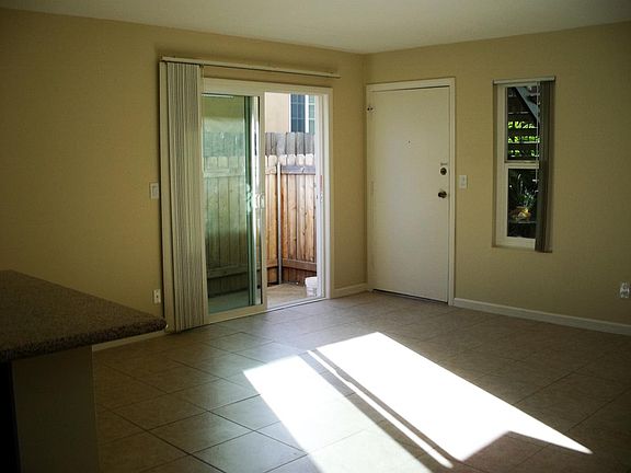 private fenced patio just off living room