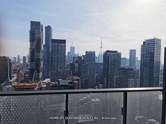 3rd image of 11 Wellesley St W #2408