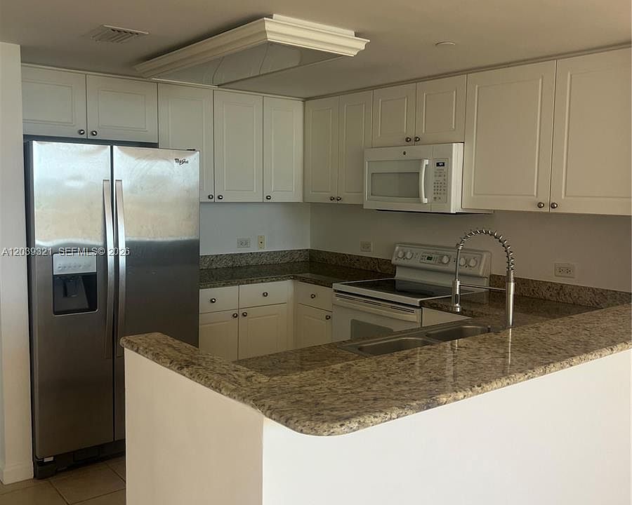 1st image of 19501 W Country Club Dr APT 611