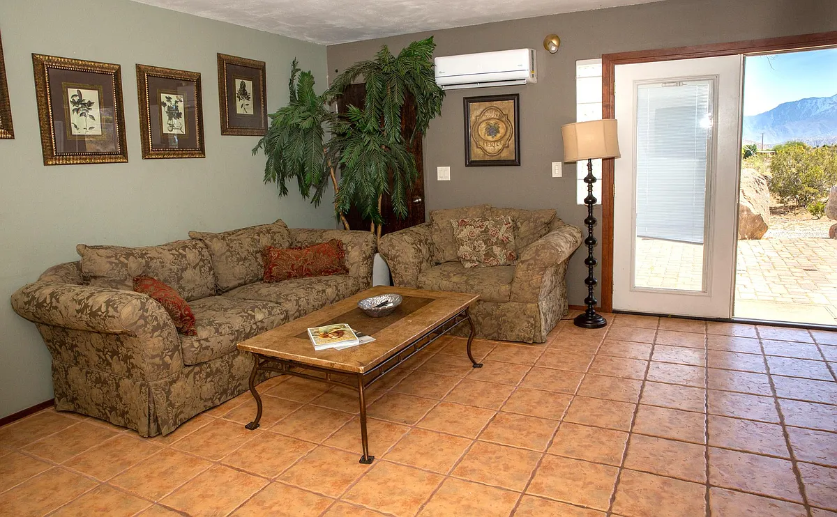 Living room area and front door - 51010 Cheyenne Trl